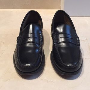 Sebago black leather penny loafers.